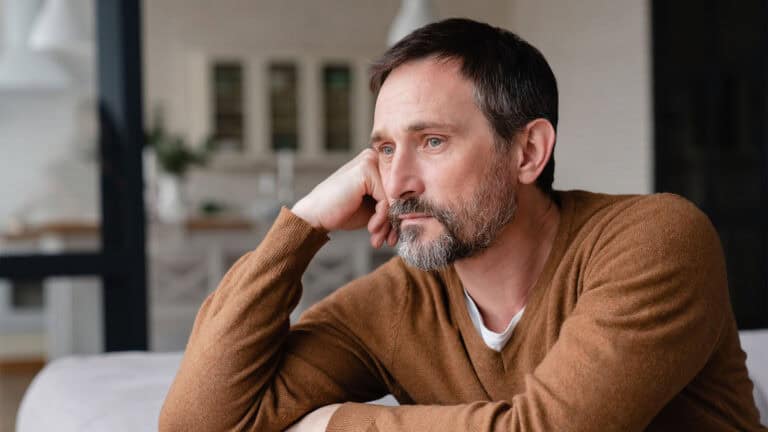 middle age man sad looking