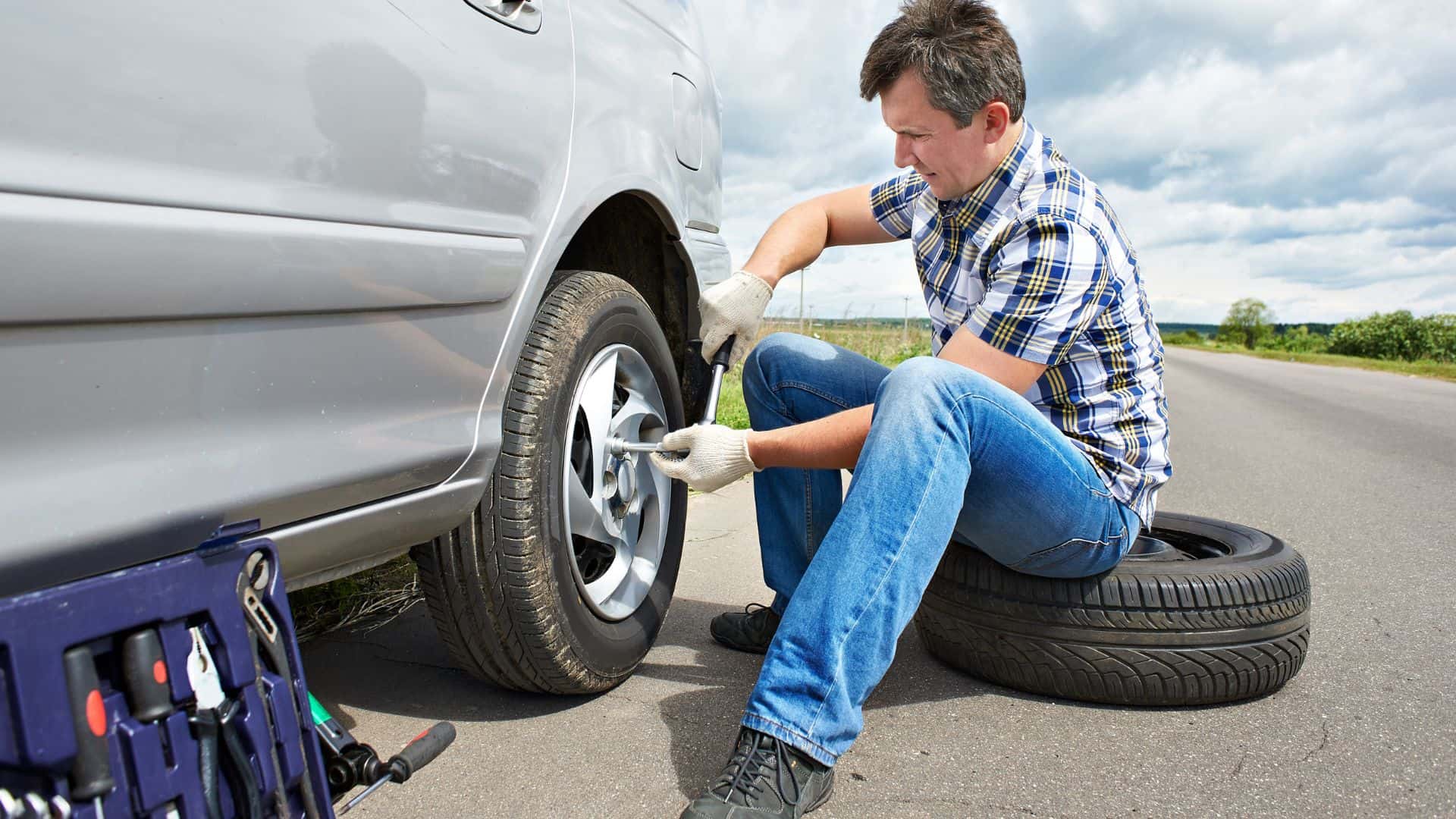 changing tire roadside