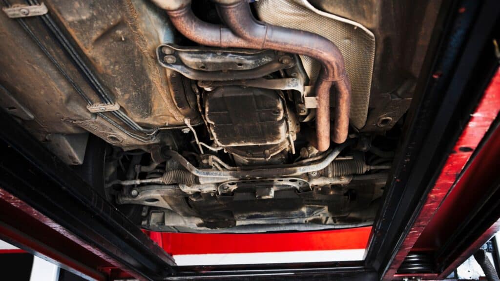 under a car exhaust pipes