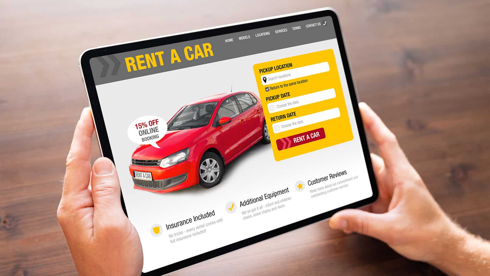 Renting a car on computer.
