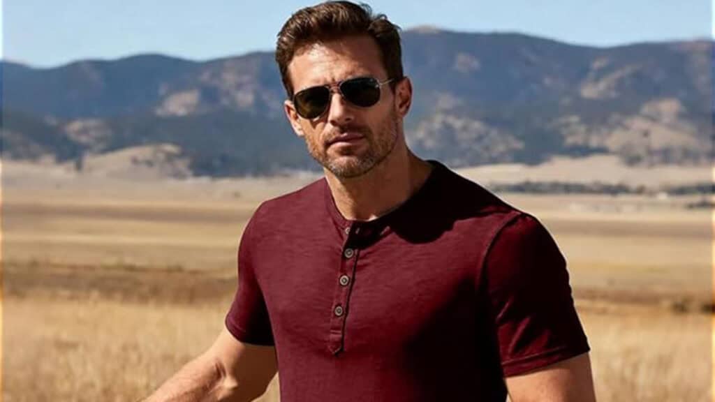 man in burgundy t-shirt.