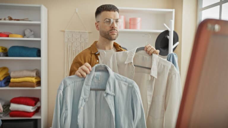 man selecting clothes.