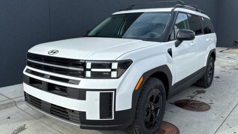 White 2025 Hyundai Santa Fe parked in driveway