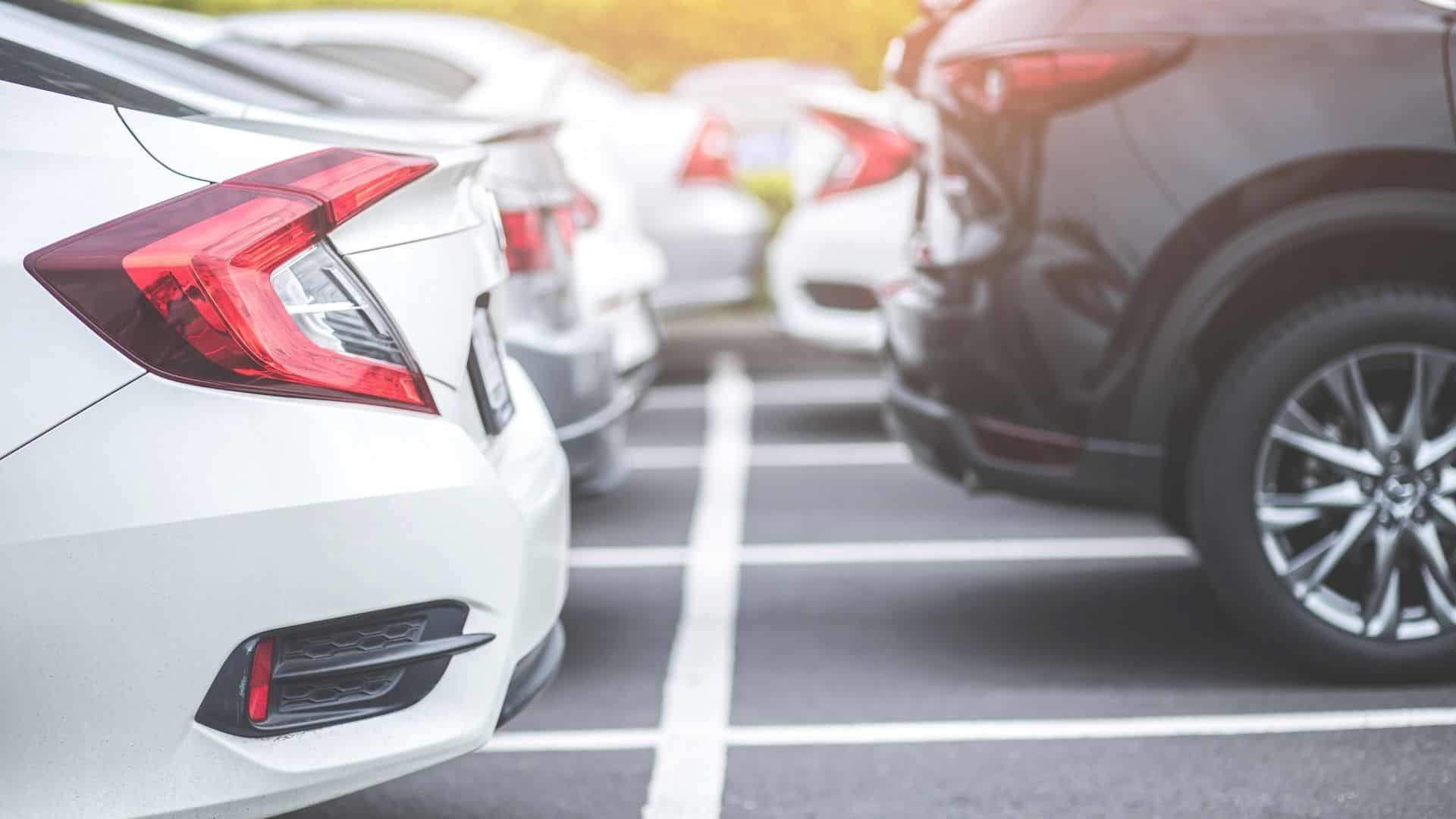 Multiple car bumpers in a parking lot
