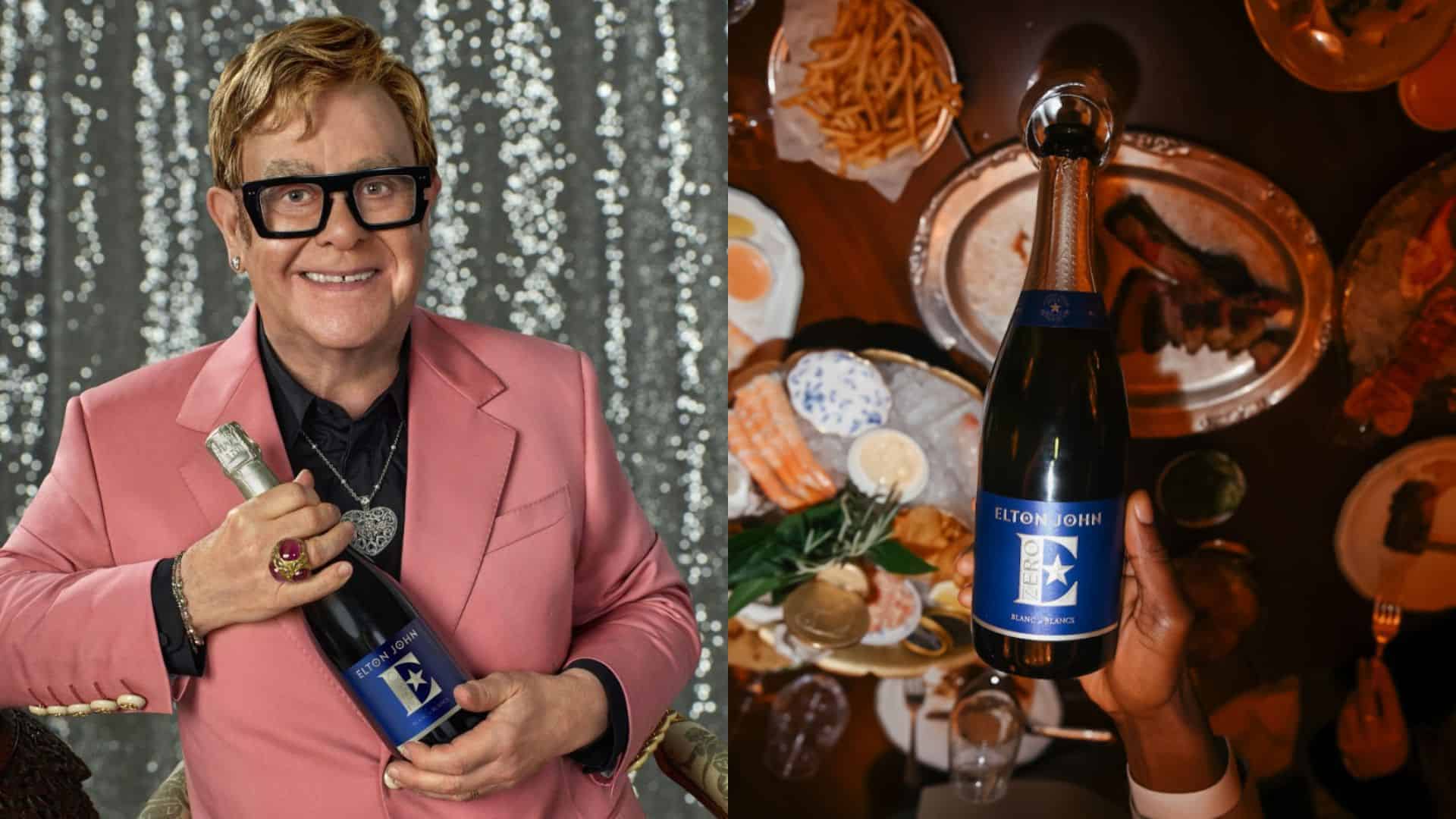 Elton John holding drink