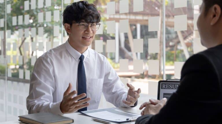 A young guy giving interview for job