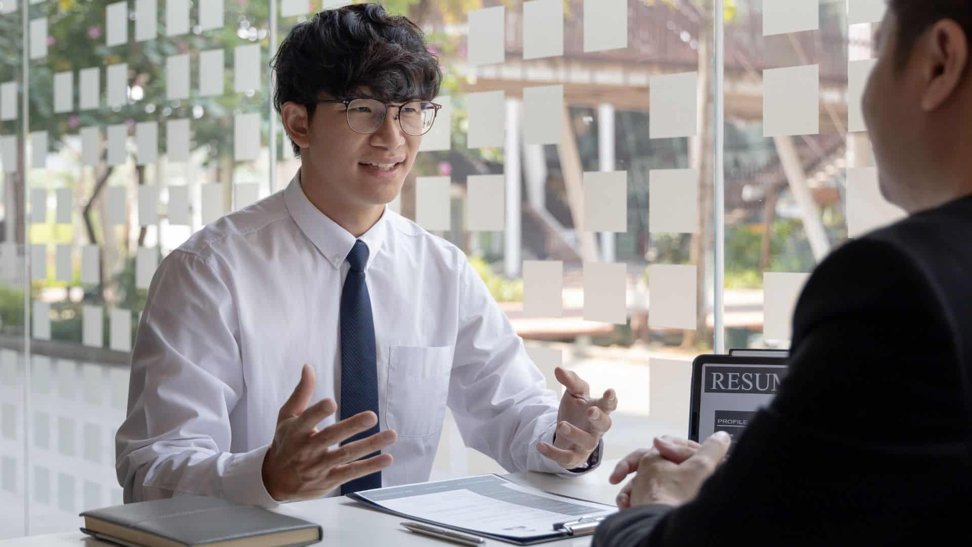 A young guy giving interview for job
