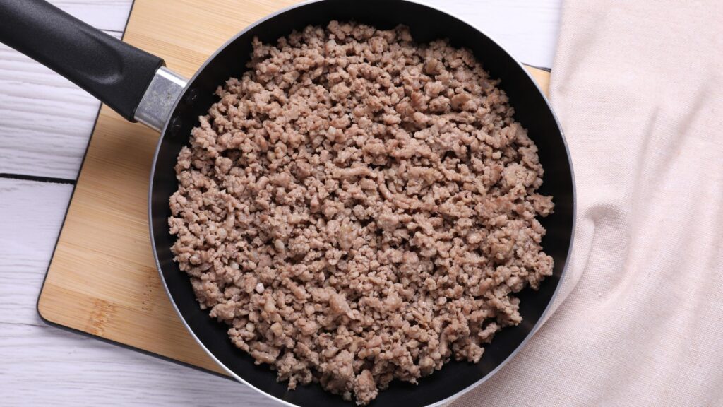 Fried minced meat in pan