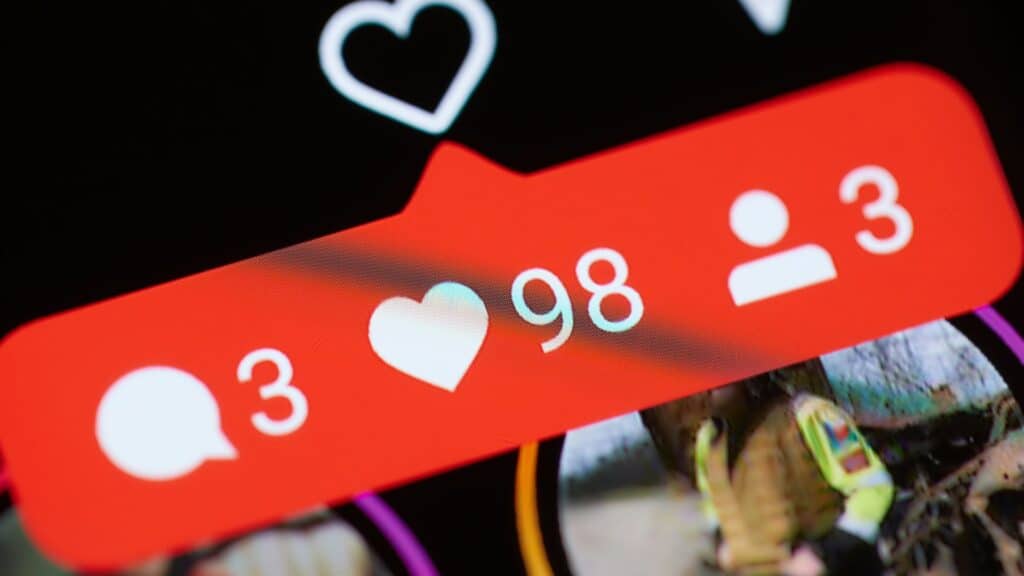 Instagram likes and messages, comment notifications popping up on a mobile device screen