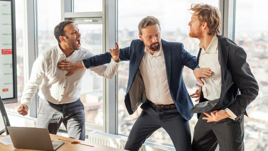 Men fight in the office.