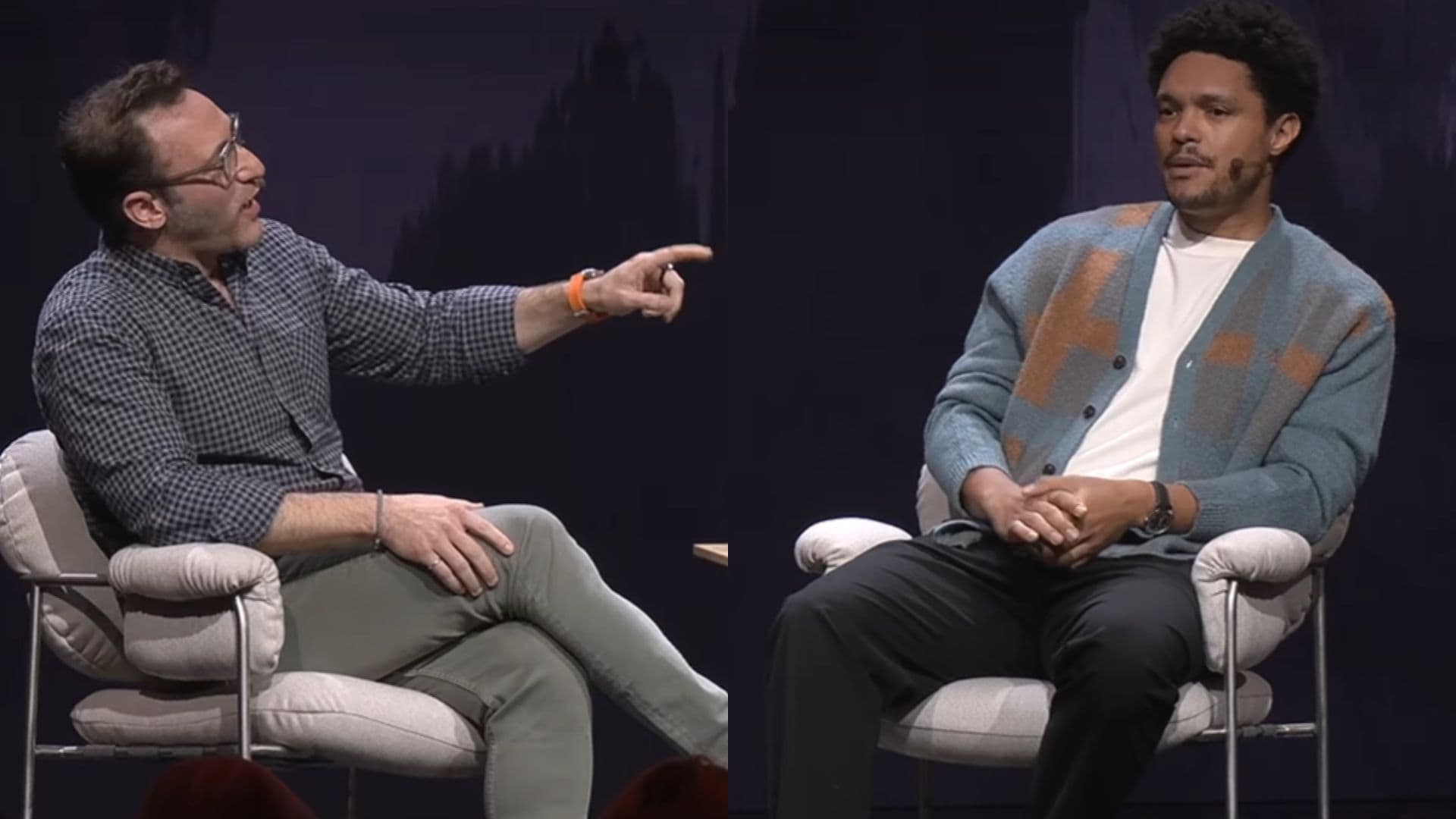 Simon Sinek and Trevor Noah on stage during an interview