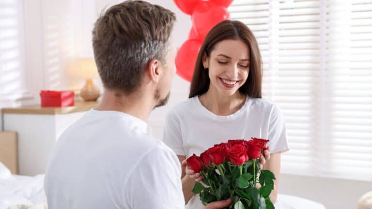 giving flowers to wife