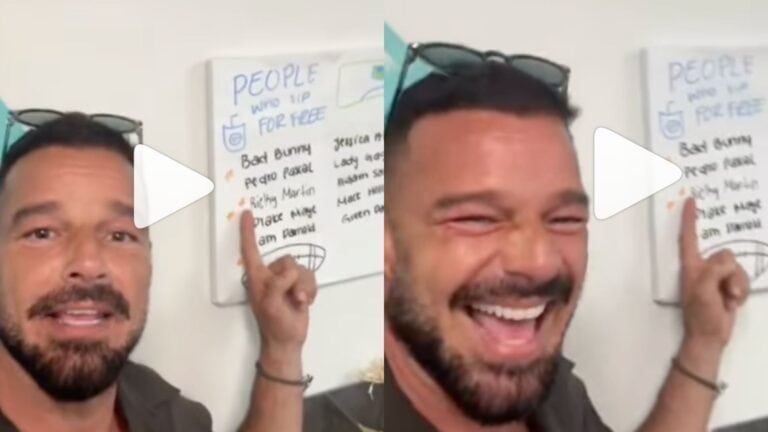 ricky martin pointing at sign