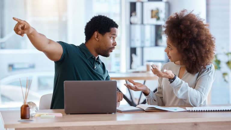 couple argue laptop.