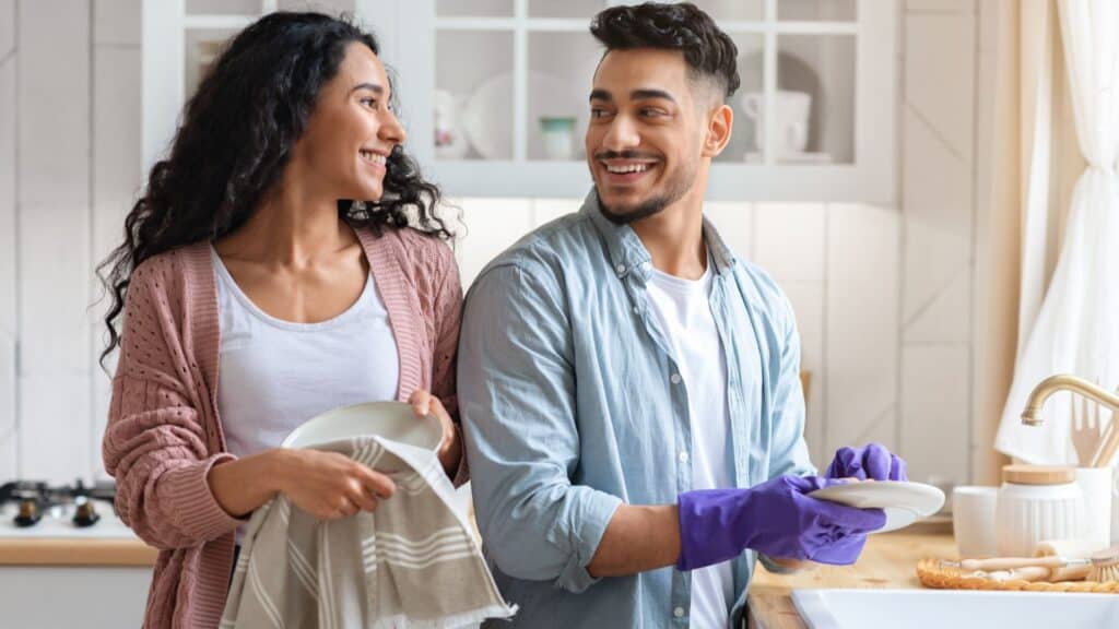 couple working together in kitchen