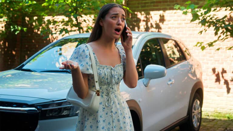 A woman argues on a phone.