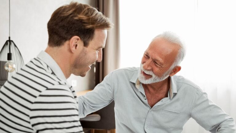 A father and his son having a conversation