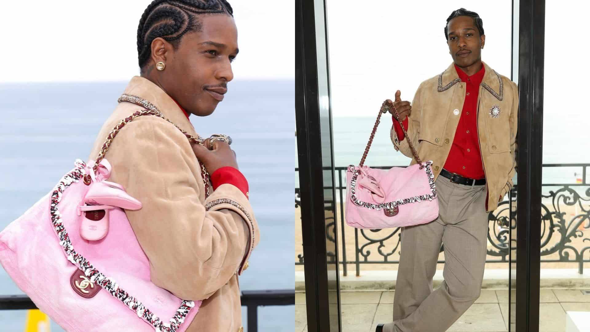 A$AP Rocky carrying a pink purse