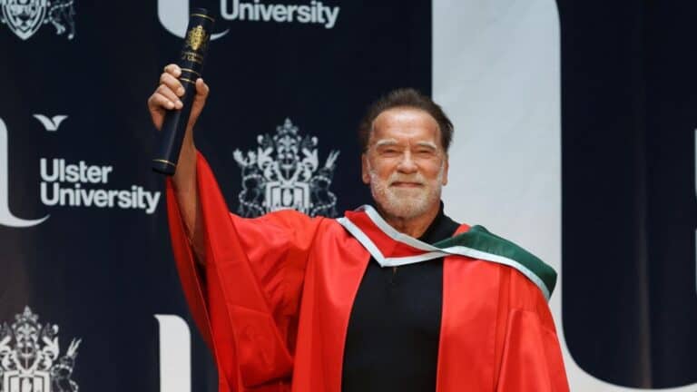 Arnold Schwarzenegger holding his honorary degree