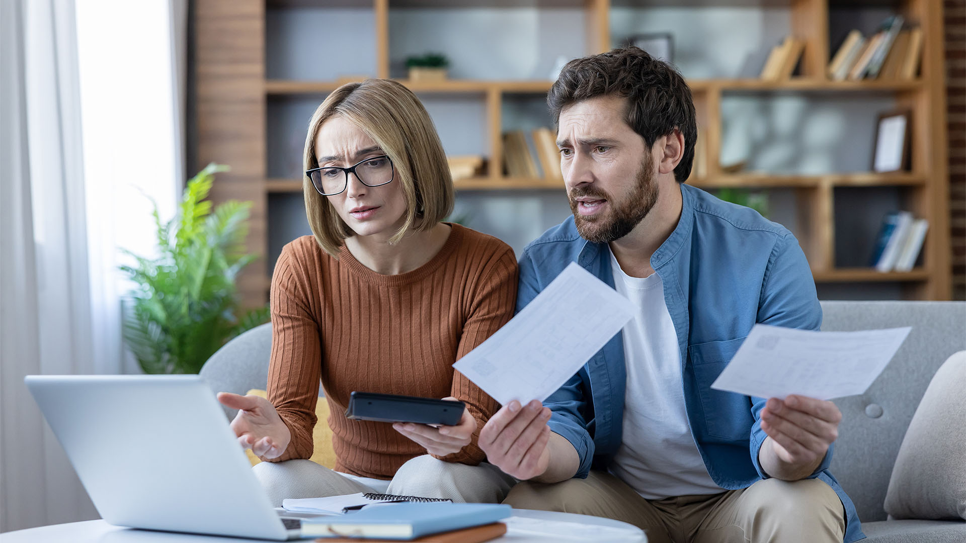 Couple reading documents.