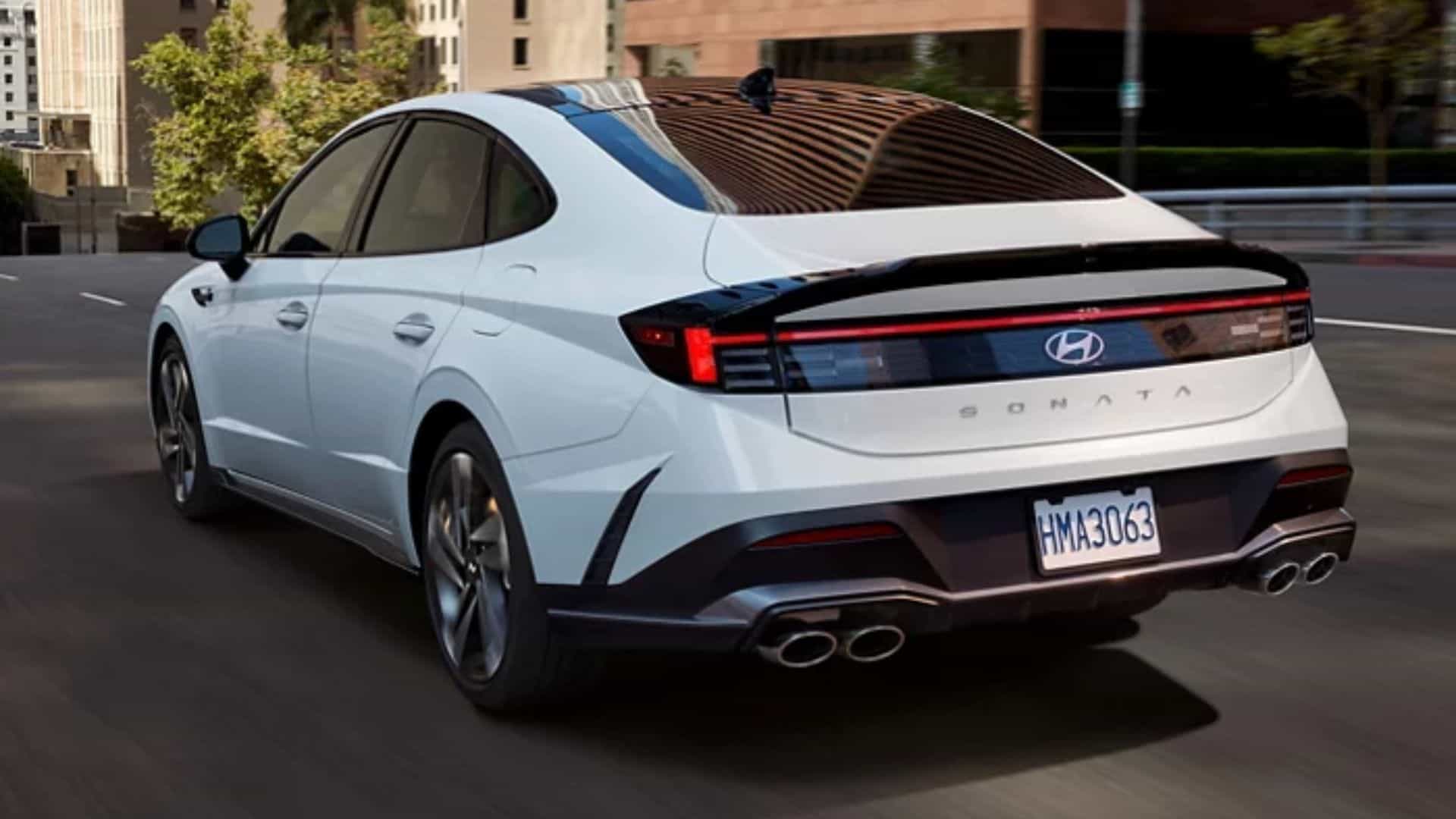 White 2026 Hyundai Sonata driving down the street