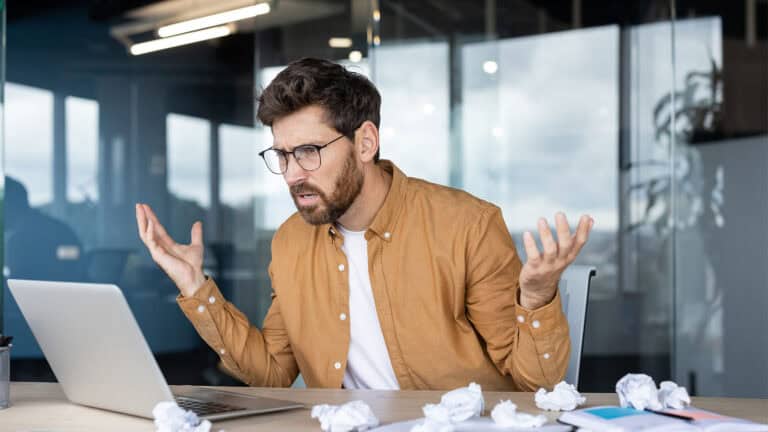 Man struggle at work office.