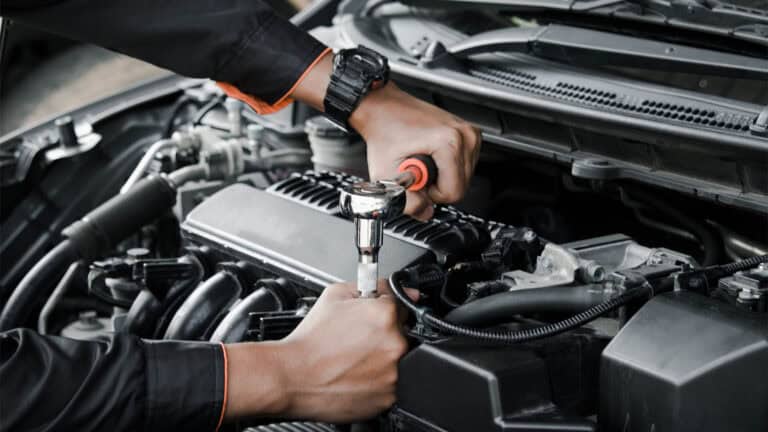 Mechanic fixing a car