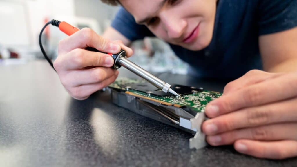 Student working on a welding circuit