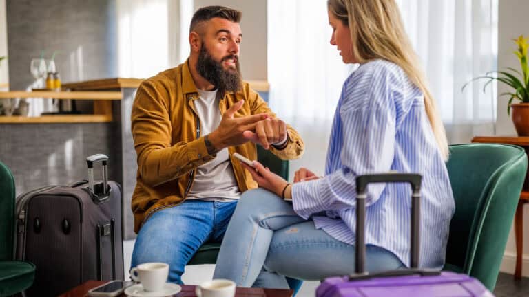 A couple argues about traveling plans