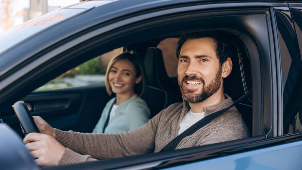 A couple driving