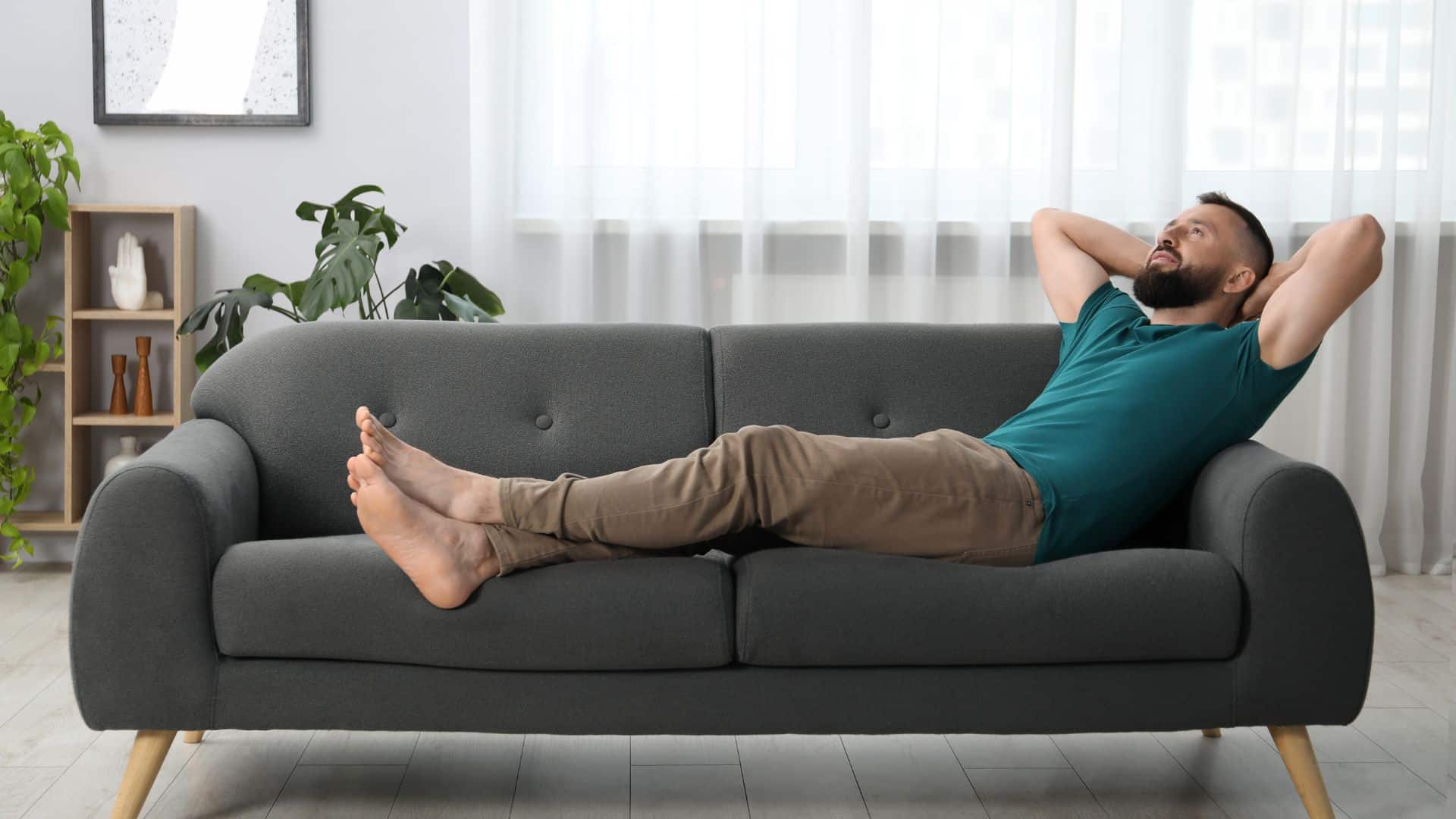 Man resting on couch