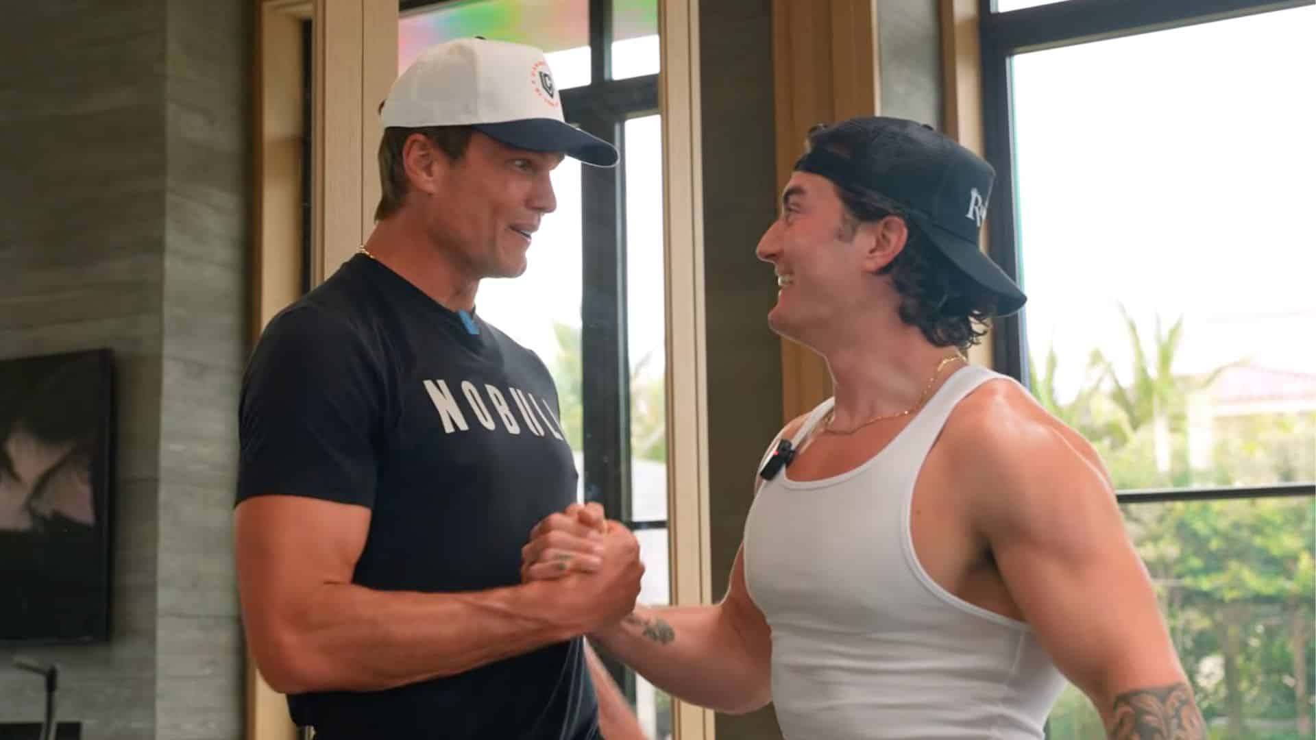 Tom Brady and Jesse James West shake hands