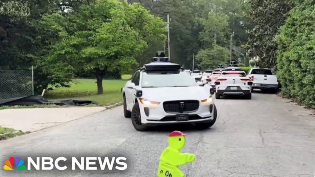 driverless Waymo taxis on the road
