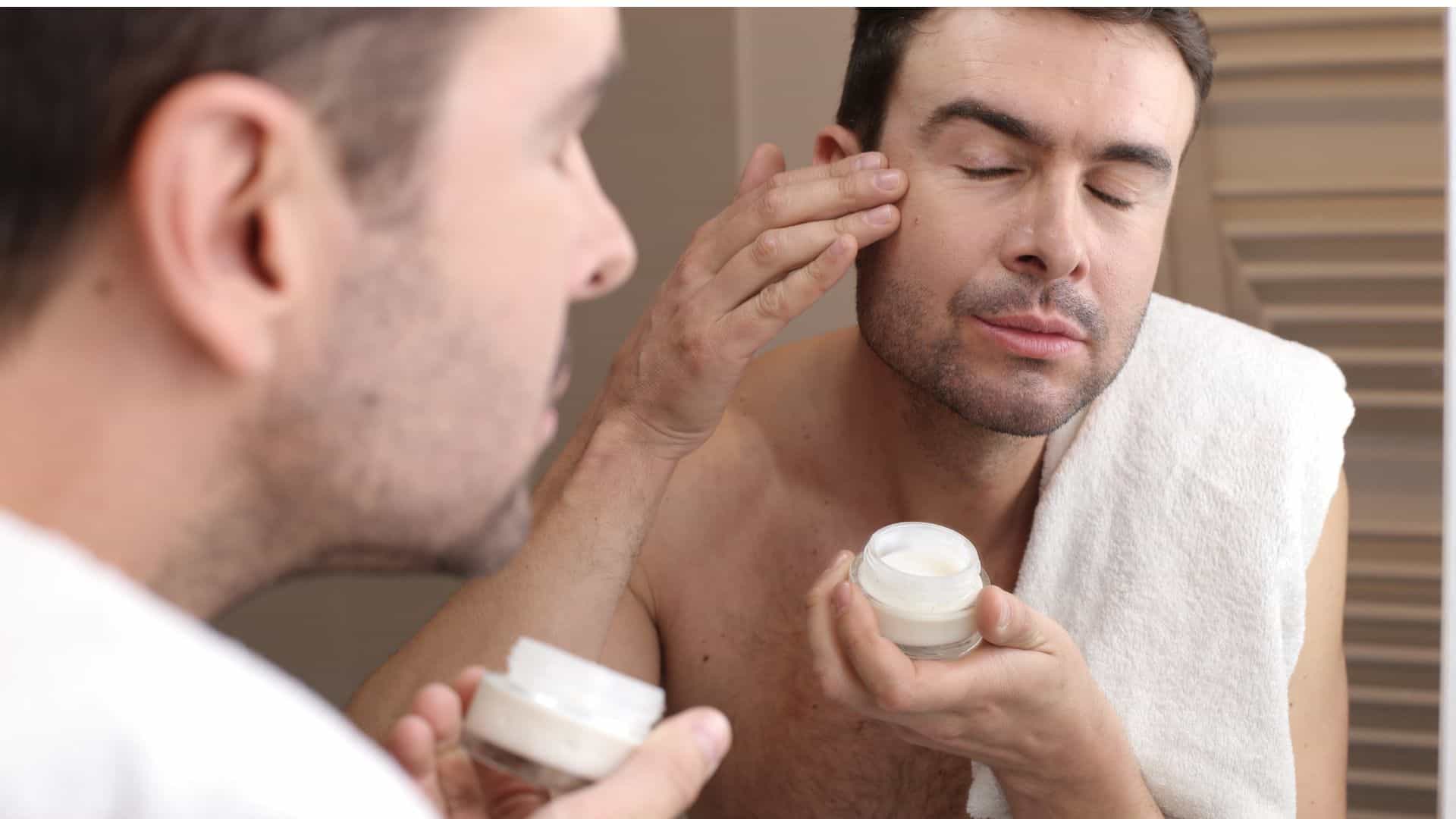 A man doing his skincare