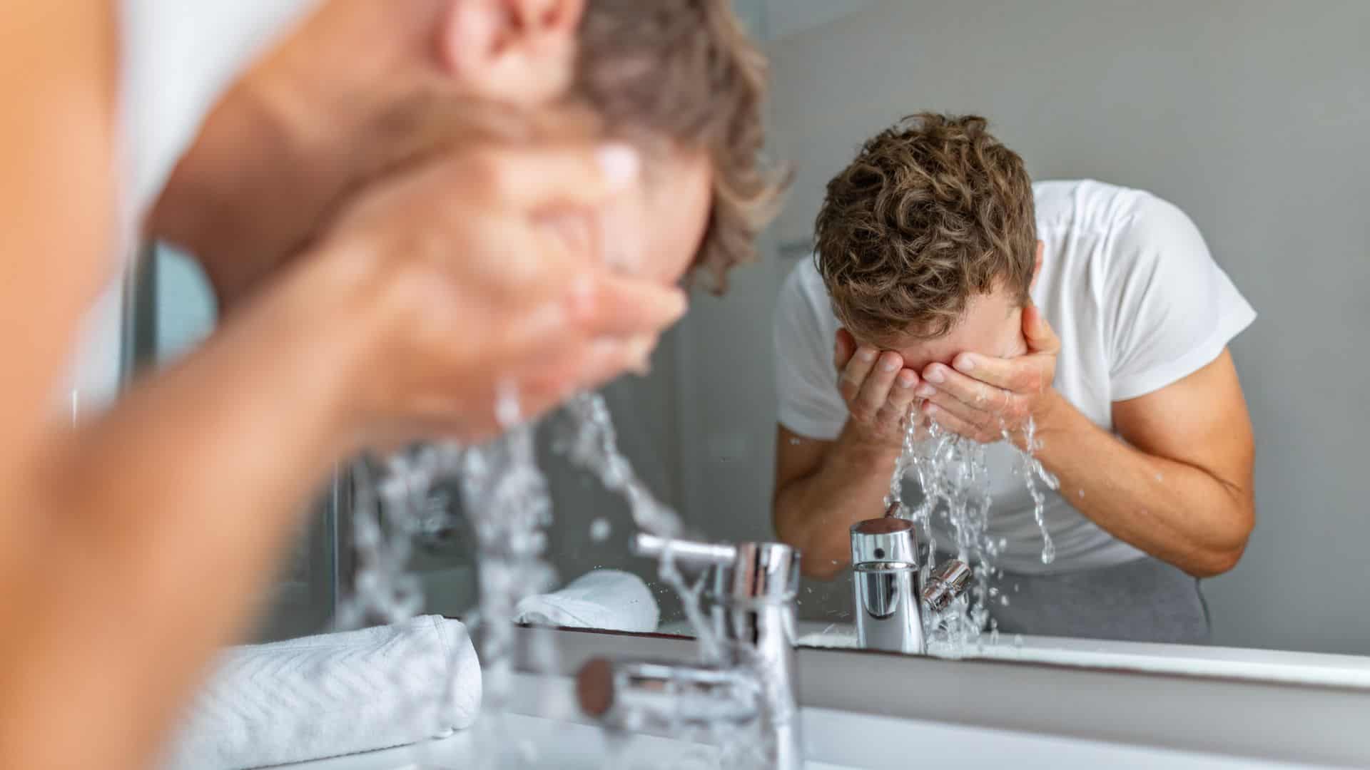 A man washing his face
