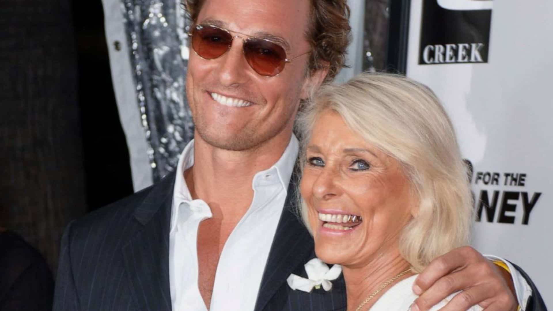 Matthew McConaughey and his mother pose on a red carpet together