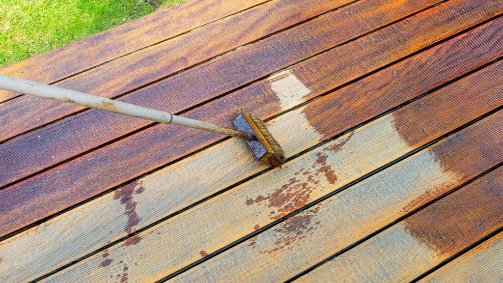 Apply oil on a wooden deck